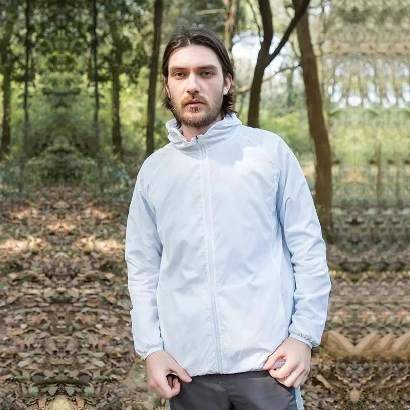 Rain Repellent Hiking Jacket with Adjustable Hood and Breathable Polyester, Packable Design for Men and Women