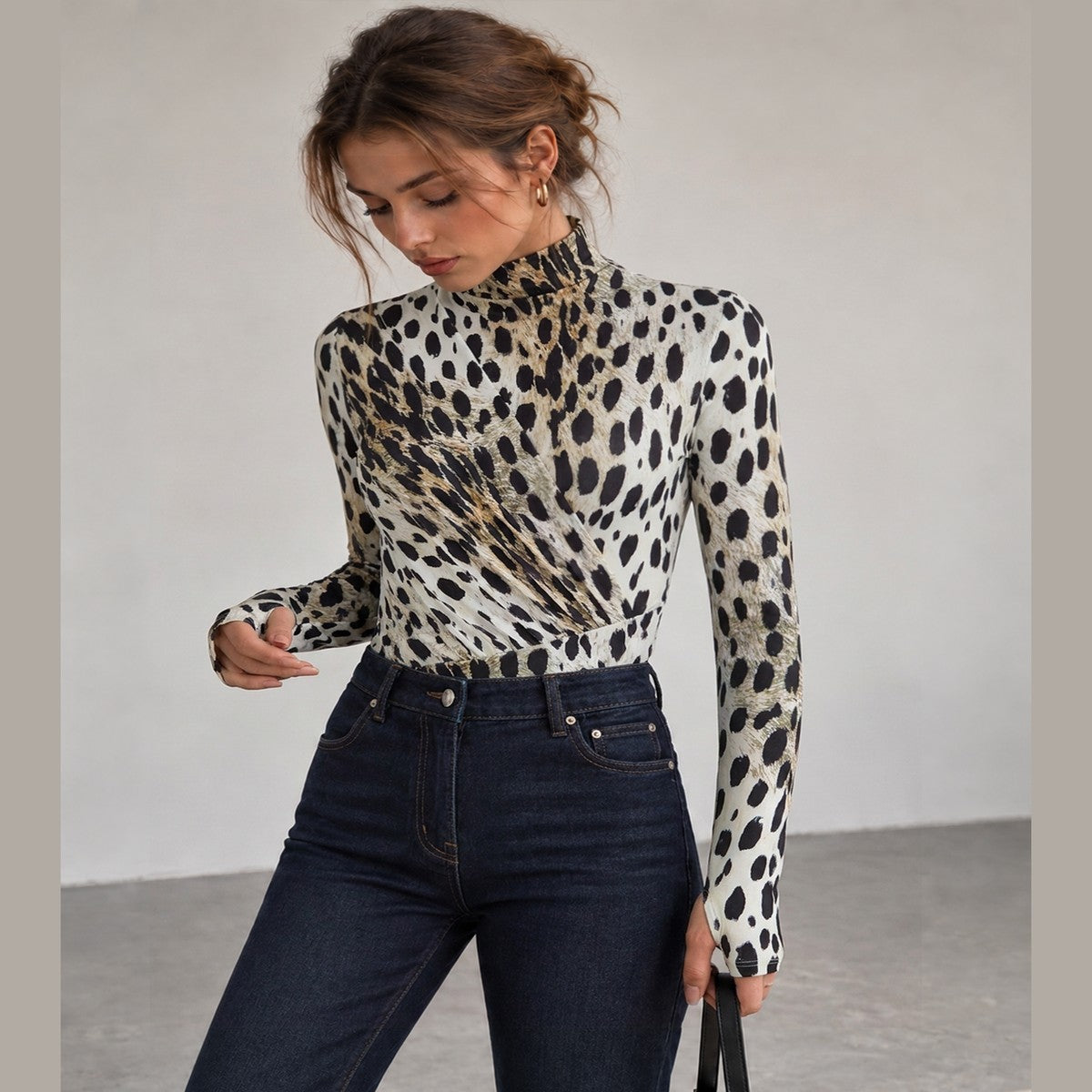 Sleeveless High Neck Bodysuit with Black and White Leopard Pattern