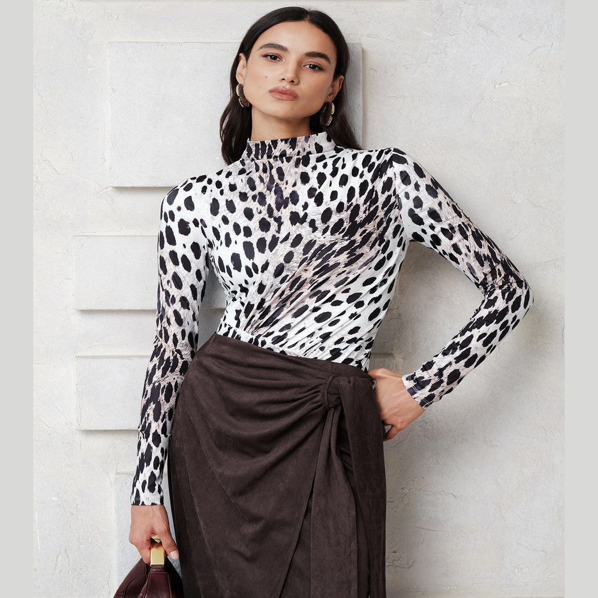 Sleeveless High Neck Bodysuit with Black and White Leopard Pattern
