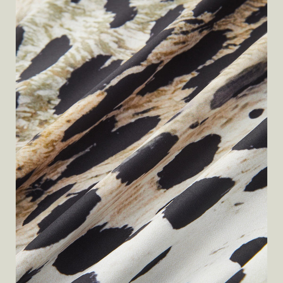 Sleeveless High Neck Bodysuit with Black and White Leopard Pattern