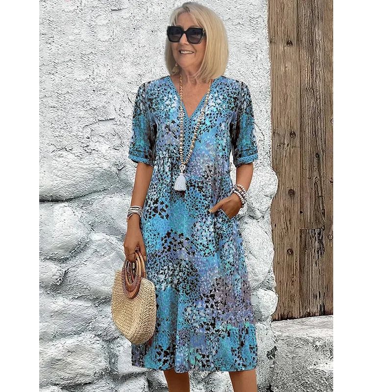 Colorful Midi Dress with Patterned Design and Functional Pockets