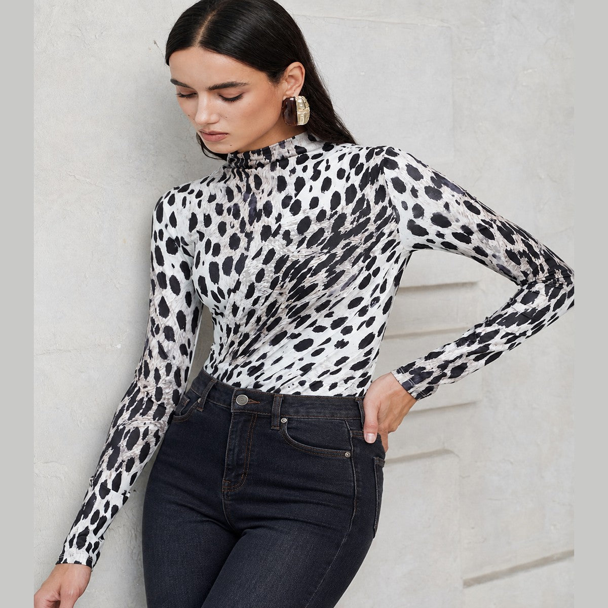 Sleeveless High Neck Bodysuit with Black and White Leopard Pattern