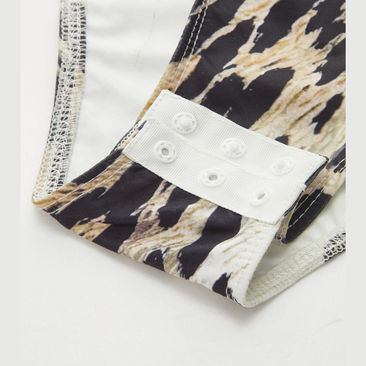 Sleeveless High Neck Bodysuit with Black and White Leopard Pattern