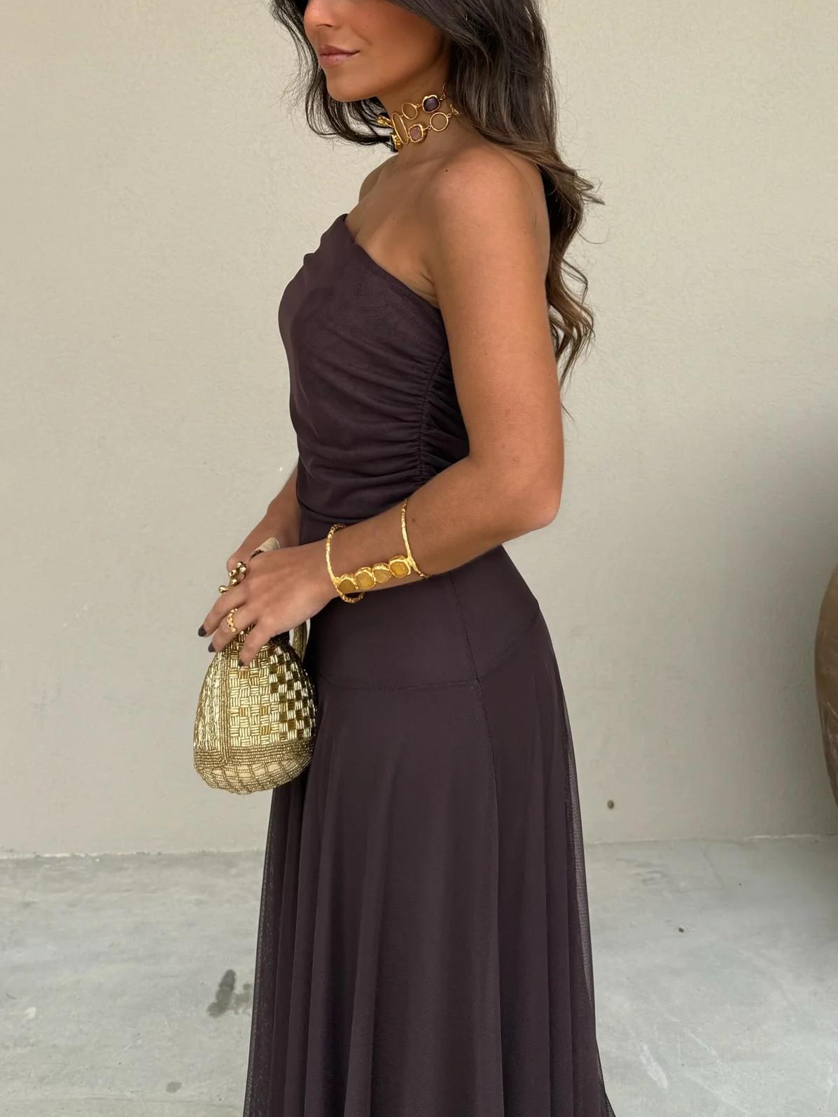 Beautiful women's off-shoulder brown maxi dress, a romantic flowy evening gown for wedding guests or parties.
