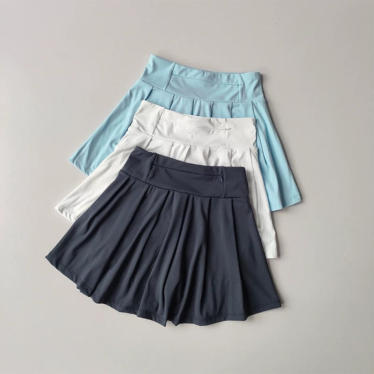 Women Athletic Polo Top and Pleated Tennis Skirt Two Piece Set with Striped Trim