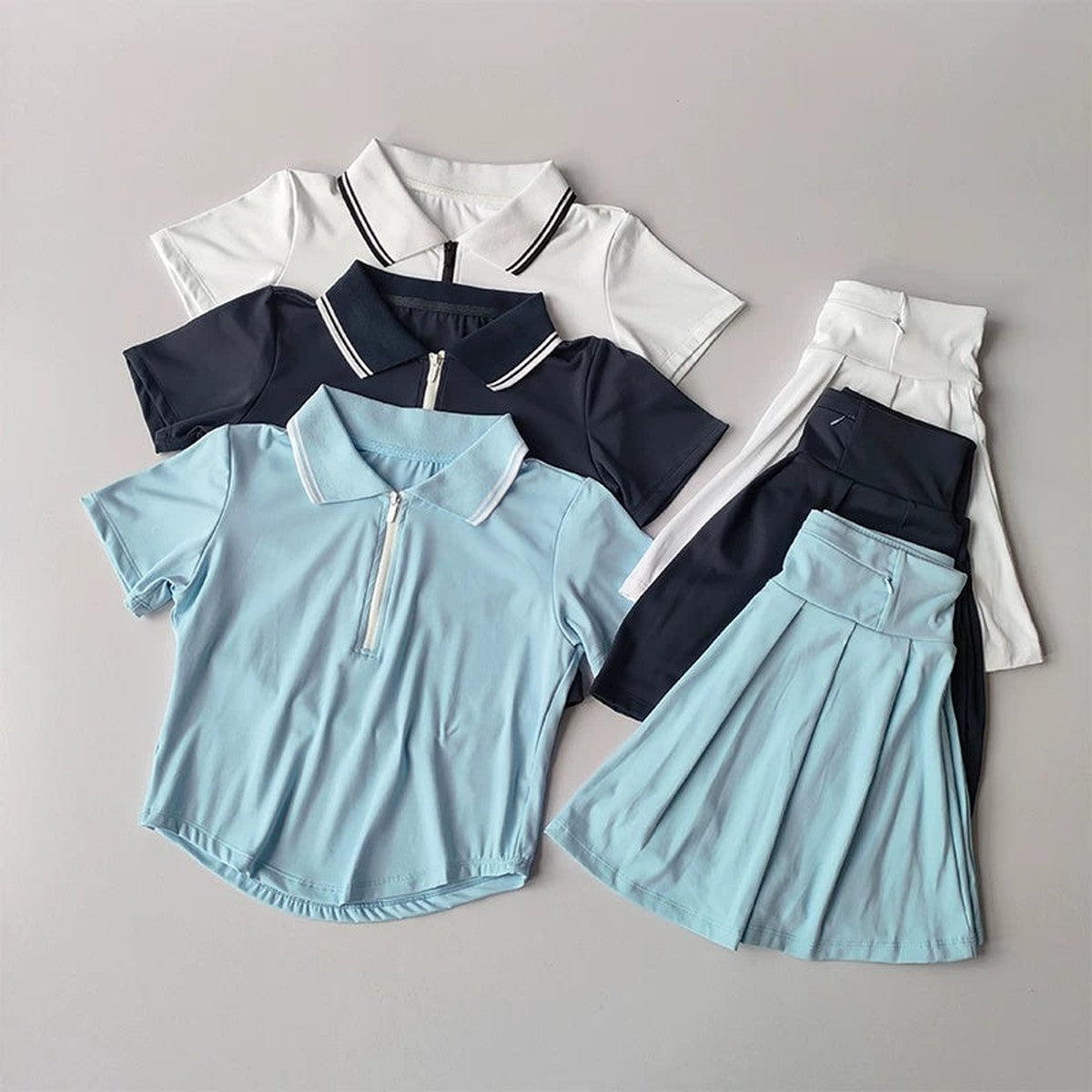 Women Athletic Polo Top and Pleated Tennis Skirt Two Piece Set with Striped Trim
